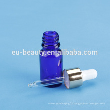 glass packaging bottle with black metal dropper wholesale